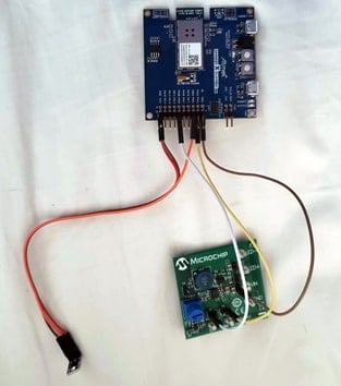 The SAM W25 board (top), TEMT6000 light sensor (bottom left), and LED driver board (bottom right).