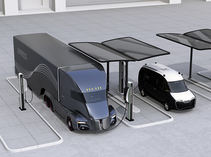 Delivery vans and trucks and refuse trucks are depot charged, and the charging stations can include integrated solar panels