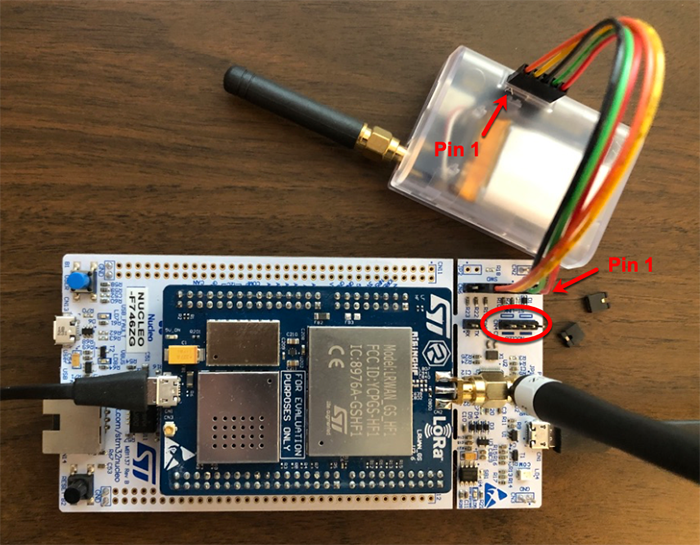 A 5-pin multi-colored cable connects the LoRa IoT tracker's 5-pin
            programming connector to CN6 on the NUCLEO-F746ZG
