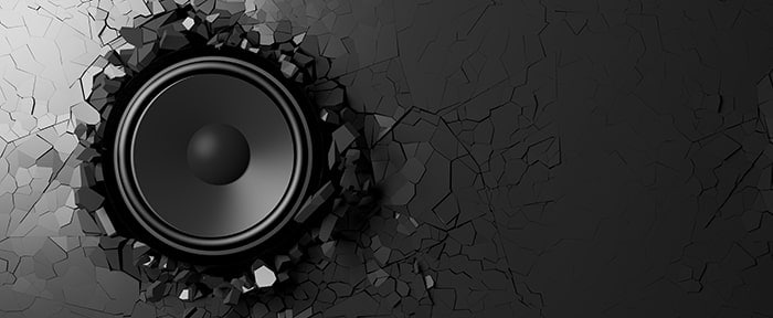 speaker breaking through wall